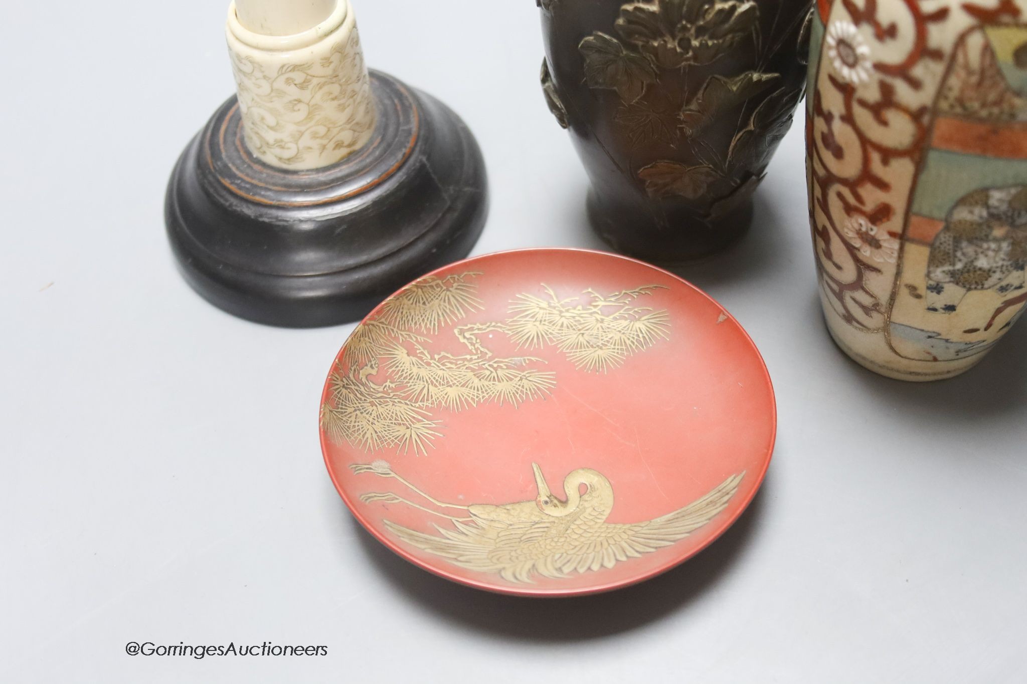 Various Japanese collectables including two bronze vases, a carving, a porcelain vase and a lacquer dish, tallest 27cm